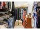 A large walk in closet with ample storage space for clothes, shoes, and more at 729 Quintan St, Summerville, SC 29486