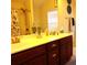 Bathroom featuring double sinks, cherry wood cabinets, and shower and tub combo at 8592 Sentry Cir, North Charleston, SC 29420