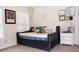 Cozy bedroom featuring a daybed, unique decor, and bright natural light at 8592 Sentry Cir, North Charleston, SC 29420