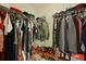 Walk-in closet featuring ample hanging space, shelving and shoe storage on the floor at 8592 Sentry Cir, North Charleston, SC 29420