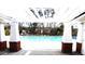 Community pool featuring a pergola and ample seating with wooded scenery at 8592 Sentry Cir, North Charleston, SC 29420
