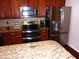 Modern kitchen featuring stainless steel appliances and granite countertops at 8592 Sentry Cir, North Charleston, SC 29420