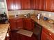 The kitchen features granite countertops, stainless steel appliances, and wood cabinets at 8592 Sentry Cir, North Charleston, SC 29420