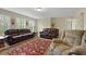 Bright living room with comfortable seating, creating a cozy space for relaxation and gatherings at 8592 Sentry Cir, North Charleston, SC 29420