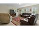 Relaxing living room with comfortable seating, natural light, and movie-themed decor at 8592 Sentry Cir, North Charleston, SC 29420