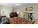 Spacious living room with comfortable seating and a vibrant rug, creating a cozy atmosphere at 8592 Sentry Cir, North Charleston, SC 29420