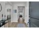 Bright entryway featuring hardwood floors, neutral walls, and modern decor at 87 Morning Song St, Summerville, SC 29485