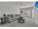 Bright living room with a comfortable sectional couch and stylish coffee table at 87 Morning Song St, Summerville, SC 29485