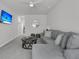 Bright living room with a comfortable sectional couch and stylish coffee table at 87 Morning Song St, Summerville, SC 29485