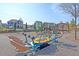 Enjoy the community playground and equipment, located near community homes and manicured lawns at 87 Morning Song St, Summerville, SC 29485