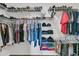 Spacious walk-in closet with built-in shelving and organization system for clothes and shoes at 87 Morning Song St, Summerville, SC 29485