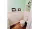 Stylish bathroom with wainscoting, and a toilet, creating a clean and functional space at 927 Dills Bluff Rd # 33, Charleston, SC 29412