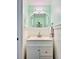 Chic powder room featuring wainscoting, a vanity with storage, and a stylish mirror for a refined look at 927 Dills Bluff Rd # 33, Charleston, SC 29412