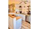Well-lit kitchen showcasing light blue cabinets, butcher block countertops, and modern stainless steel appliances at 927 Dills Bluff Rd # 33, Charleston, SC 29412