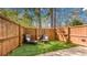 Cozy backyard with artificial turf, wooden fence, and outdoor seating for relaxing at 947 E Estates Blvd # C, Charleston, SC 29414