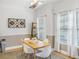 Bright dining room with modern decor and large windows for plenty of natural light at 947 E Estates Blvd # C, Charleston, SC 29414