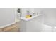 Bright, well-lit hallway shows access to laundry, storage, and garage at 947 E Estates Blvd # C, Charleston, SC 29414