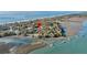 Beautiful aerial shot of waterfront property near the beach at 1009 Seacrest Ln, Folly Beach, SC 29439