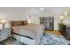 Bedroom features neutral decor, comfortable bed, and natural light at 1009 Seacrest Ln, Folly Beach, SC 29439