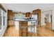 Open kitchen featuring a center island with bar seating and ample cabinet storage at 1009 Seacrest Ln, Folly Beach, SC 29439