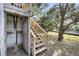 Backyard featuring a wooden playground with ladder and slide at 1009 Seacrest Ln, Folly Beach, SC 29439
