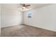 Bright bedroom featuring a ceiling fan and window view at 102 Brush Blvd, Goose Creek, SC 29445