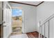 Welcoming foyer with tile flooring, white walls, and a staircase, leading into a bright and airy home at 102 Brush Blvd, Goose Creek, SC 29445