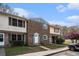 Lovely townhome featuring well-maintained landscaping, providing a welcoming and pleasant curb appeal at 102 Brush Blvd, Goose Creek, SC 29445