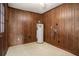 Functional laundry room features wood paneling, water heater, and utility hookups for convenience at 102 Brush Blvd, Goose Creek, SC 29445