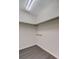 Walk-in closet with minimalist design, a clothes rod, and vinyl floors at 103 York Pl, Goose Creek, SC 29445