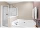 Bathroom featuring a corner shower and separate soaking tub at 104 Chemistry Cir, Ladson, SC 29456