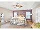 Cozy bedroom with a tray ceiling, plush carpet and natural light at 104 Chemistry Cir, Ladson, SC 29456