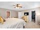 Bedroom featuring a ceiling fan, a spacious walk-in closet, and neutral paint at 104 Chemistry Cir, Ladson, SC 29456