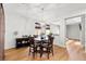 Cozy dining room featuring a modern light fixture and a view to the adjacent rooms at 104 Chemistry Cir, Ladson, SC 29456