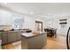Stylish kitchen with an island, modern appliances, and a view to the dining room at 104 Chemistry Cir, Ladson, SC 29456