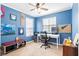 Bright office space with a ceiling fan, two windows and a modern white desk setup at 104 Chemistry Cir, Ladson, SC 29456