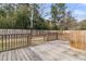 Wooden back deck overlooking fenced backyard at 105 Gourdin St, Saint Stephen, SC 29479