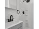 Bathroom with modern finishes featuring gray vanity and sleek black fixtures at 105 Gourdin St, Saint Stephen, SC 29479