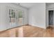 Bright bedroom with a full light glass french door leading to an outdoor patio and backyard at 105 Gourdin St, Saint Stephen, SC 29479