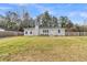 Charming single-story home featuring a well-manicured lawn, painted brick, and a classic design at 105 Gourdin St, Saint Stephen, SC 29479