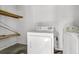 Laundry room with washer, dryer, and shelving at 105 Gourdin St, Saint Stephen, SC 29479