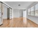 Bright living room with modern sliding barn doors and a large window offers an open concept feel at 105 Gourdin St, Saint Stephen, SC 29479