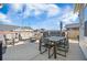 Spacious backyard patio with an outdoor dining and lounge area at 107 Cotton Blossom Way, Summerville, SC 29485