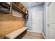 Mudroom with built-in shelving, bench seating, and modern design, perfect for organization at 107 Cotton Blossom Way, Summerville, SC 29485