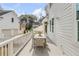 Cozy patio area with outdoor seating, ideal for relaxing and entertaining guests at 124 Beresford Creek St, Charleston, SC 29492