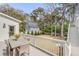 Well-maintained backyard featuring a spacious patio and a charming garage at 124 Beresford Creek St, Charleston, SC 29492