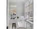 Bright, spacious bathroom featuring a soaking tub, and large windows for natural light at 124 Beresford Creek St, Charleston, SC 29492