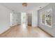 Bright bedroom with hardwood floors, white trim, windows, closet, and recessed lighting at 124 Beresford Creek St, Charleston, SC 29492
