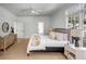 Cozy bedroom with neutral tones, plush bedding, and natural light creating a serene atmosphere at 124 Beresford Creek St, Charleston, SC 29492