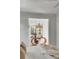 Bright bedroom view showing desk with unique design and large window bringing in natural light at 124 Beresford Creek St, Charleston, SC 29492